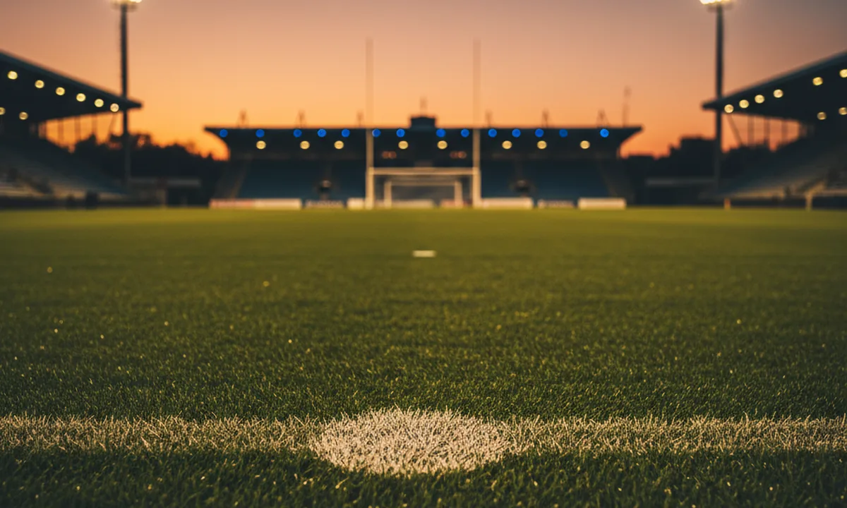 Voetbalstadion bij zonsondergang met floodlights